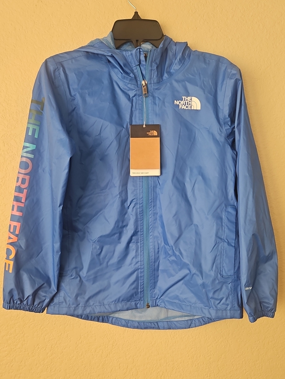 NWT The North Face Kids' Blue Hooded Rain Jacket with Logo Sleeve Print Girls 12